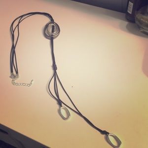 Super cute long black/silver adjustable necklace.